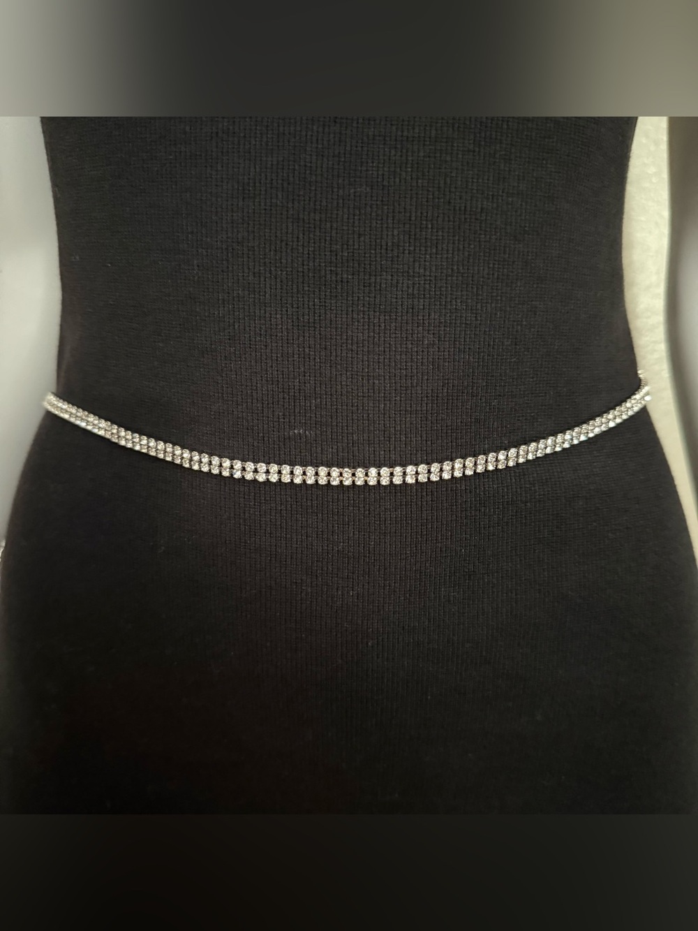 Silver tone metal skinny chain belt with rhinestone details